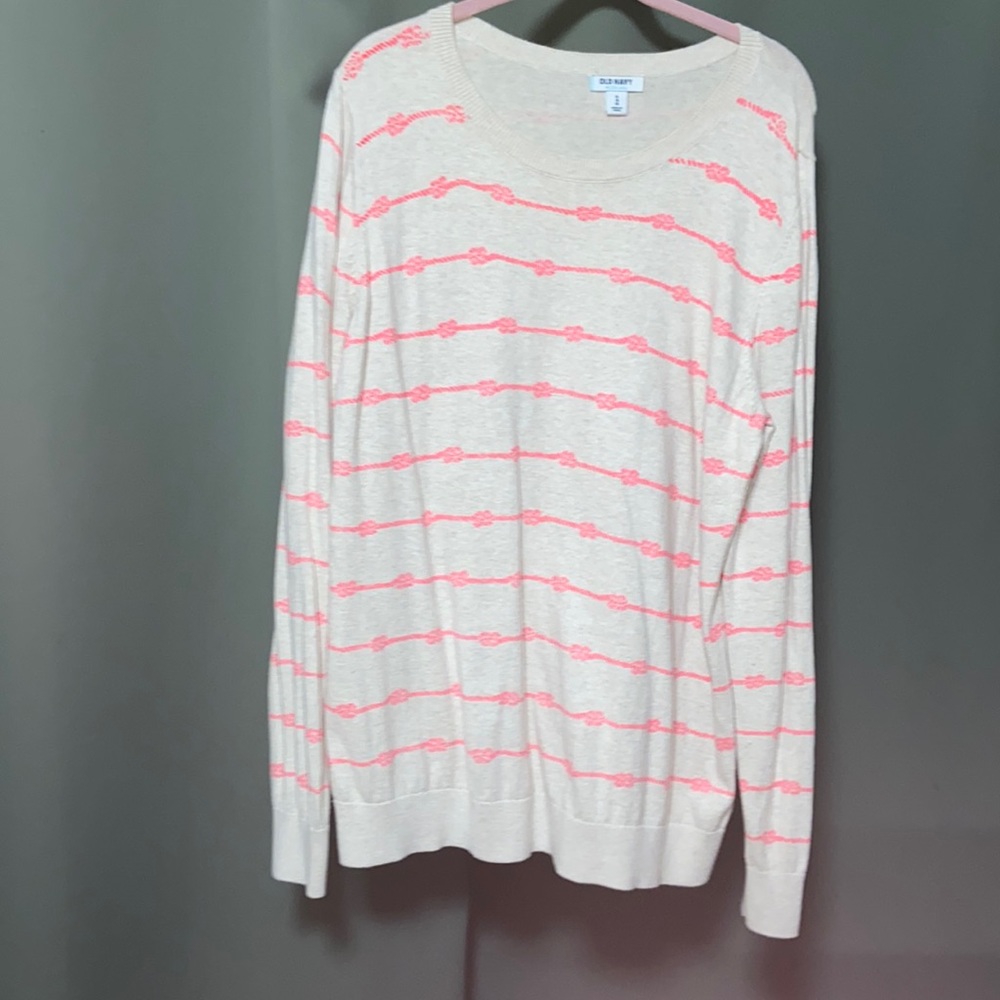 Old navy light tan sweater with coral color ropes and knots